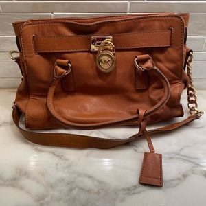 Michael Kors women’s hand bag. Camel brown color. In good condition.